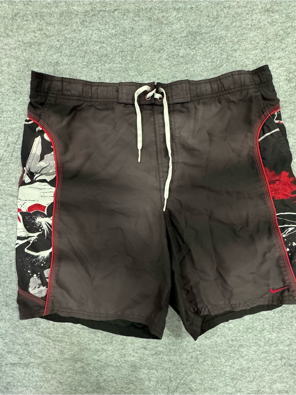 Nike Black Board Shorts with Red and White Graphic Panels